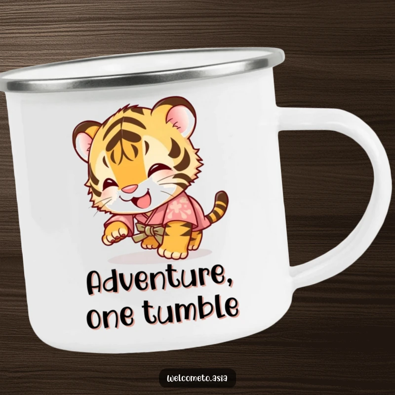Funny camping mug with a giggling tiger cub in a small kimono, tumbling forward with a hilariously joyful and adventurous spirit.