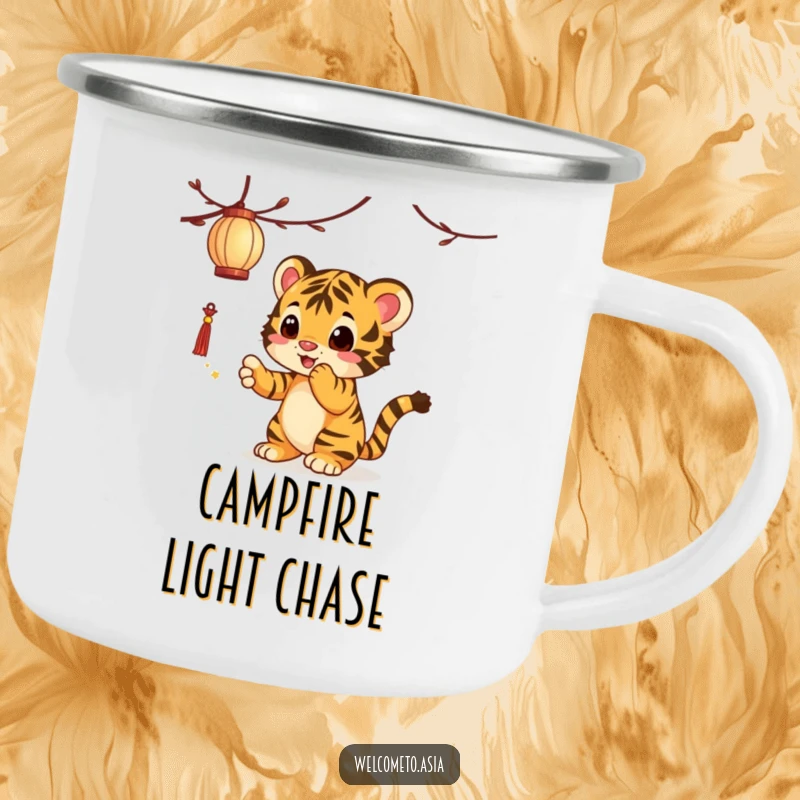 Funny Tiger Cub Camping Mug: A curious tiger cub playfully batting at a dangling lantern, ideal for outdoor sipping fun.