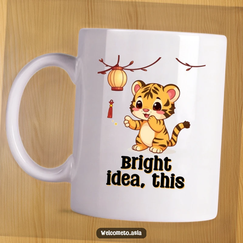 Funny Tiger Cub Mug: A curious tiger cub playfully bats at a glowing, dangling lantern, full of adventurous spirit.