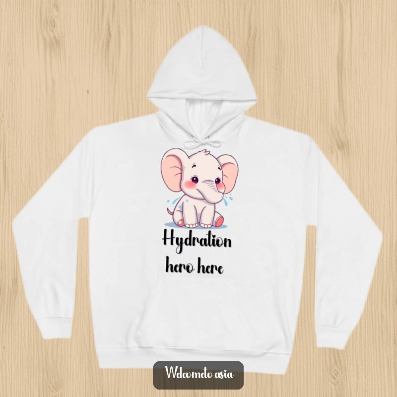 Funny Elephant Hoodie: A smiling elephant gently sprays water from its trunk, creating a scene of cozy, happy refreshment.