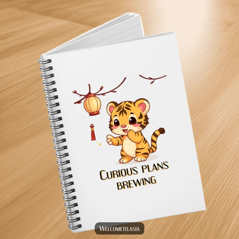 Funny Tiger Cub Notebook: A curious tiger cub playfully bats at a lantern design, ready to hold your thoughts.